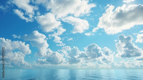 Ocean Horizon with a Blue Sky and Fluffy White Clouds