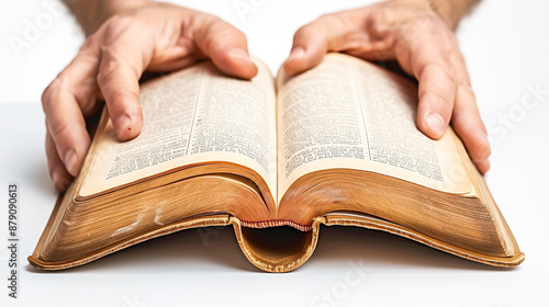 A close-up of a person's hands flipping through the pages of an open book, isolated on a white background, ideal for concepts related to reading and studying