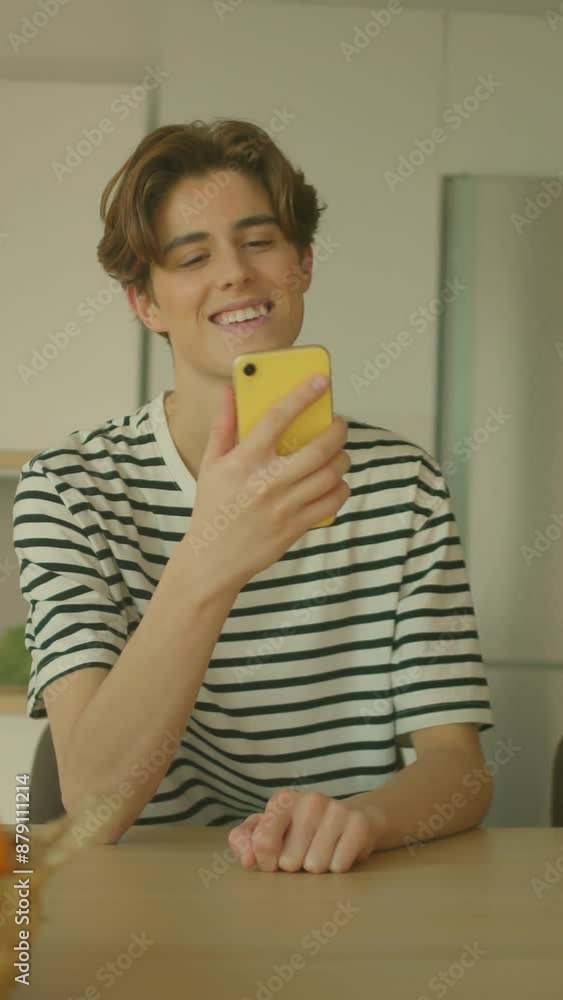 360 degree timelapse. Cheerful young Caucasian man talking on video call on smartphone. Guy holding mobile phone waving and speaking. Male student enjoying conversation. Tracking moving around 360 degree timelapse. Cheerful young Caucasian man talking on video call on smartphone. Guy holding mobile phone waving and speaking. Male student enjoying conversation. Tracking moving around