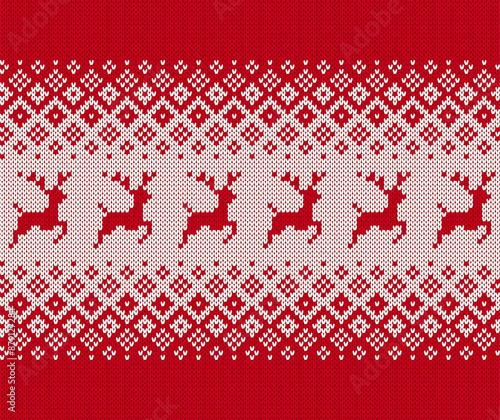 Christmas pattern with deers and geometrical ornament. Holiday fair traditional texture. Xmas seamless knit print. Knitted red sweater background. Wool pullover vector illustration.
