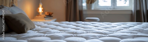 Heated Mattress Pad Focus on a heated mattress pad with a cozy bedroom background left  