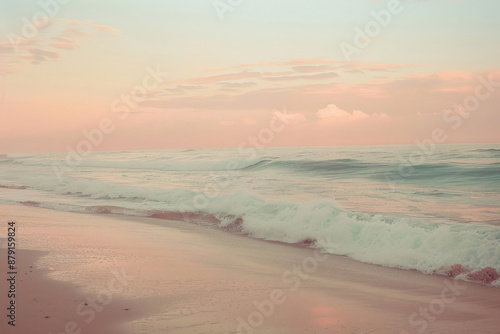 A serene beach scene unfolds at sunset, with soft pastel colors of pink and peach, a calm ocean horizon, and gentle waves lapping against golden sand.