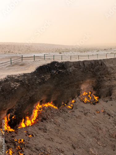 Darvaza Gas Crater, in the Karakum Desert in Turkmenistan during the day photo