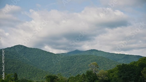 Timelapse of clouds passing over the vibrant eastern mountains of Georgia. photo