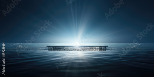 Empty podium for product installation on blue ocean water. there are beautiful rays of the sun in the background. Banner photo