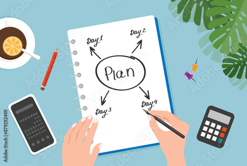 Notebook planner for describing creative ideas. Female hands draw a diagram in a notebook