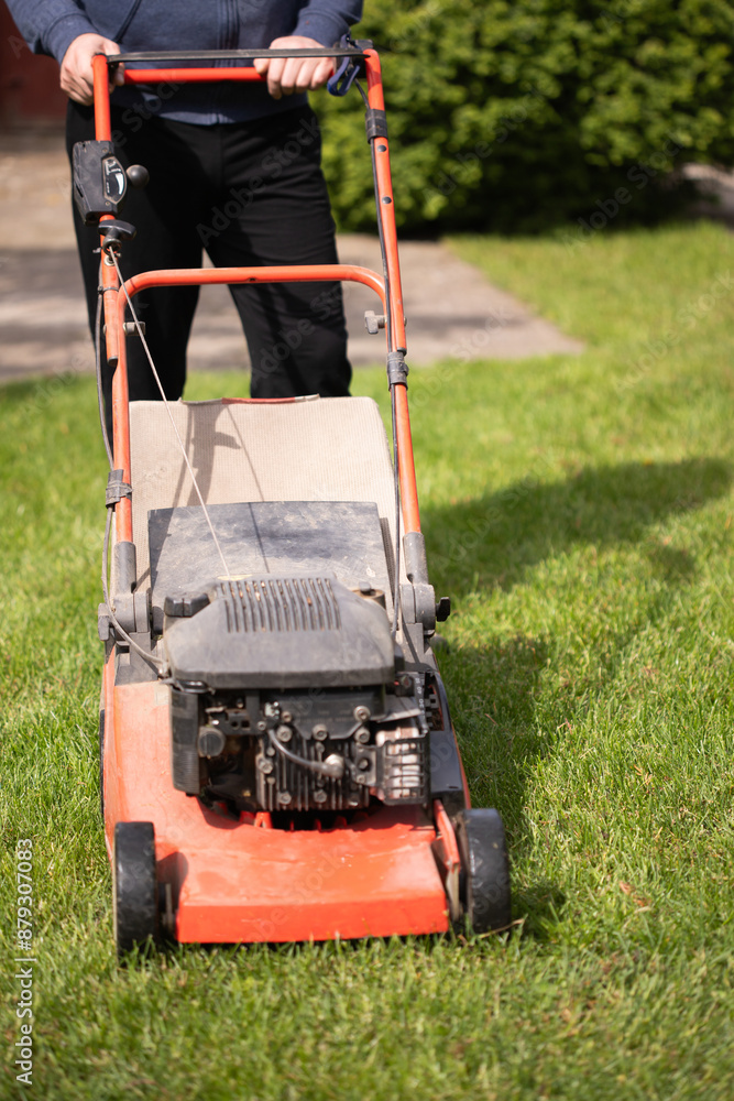 Lawn mover on green grass. Machine for cutting lawns. Lawn mover on green grass. Machine for cutting lawns.