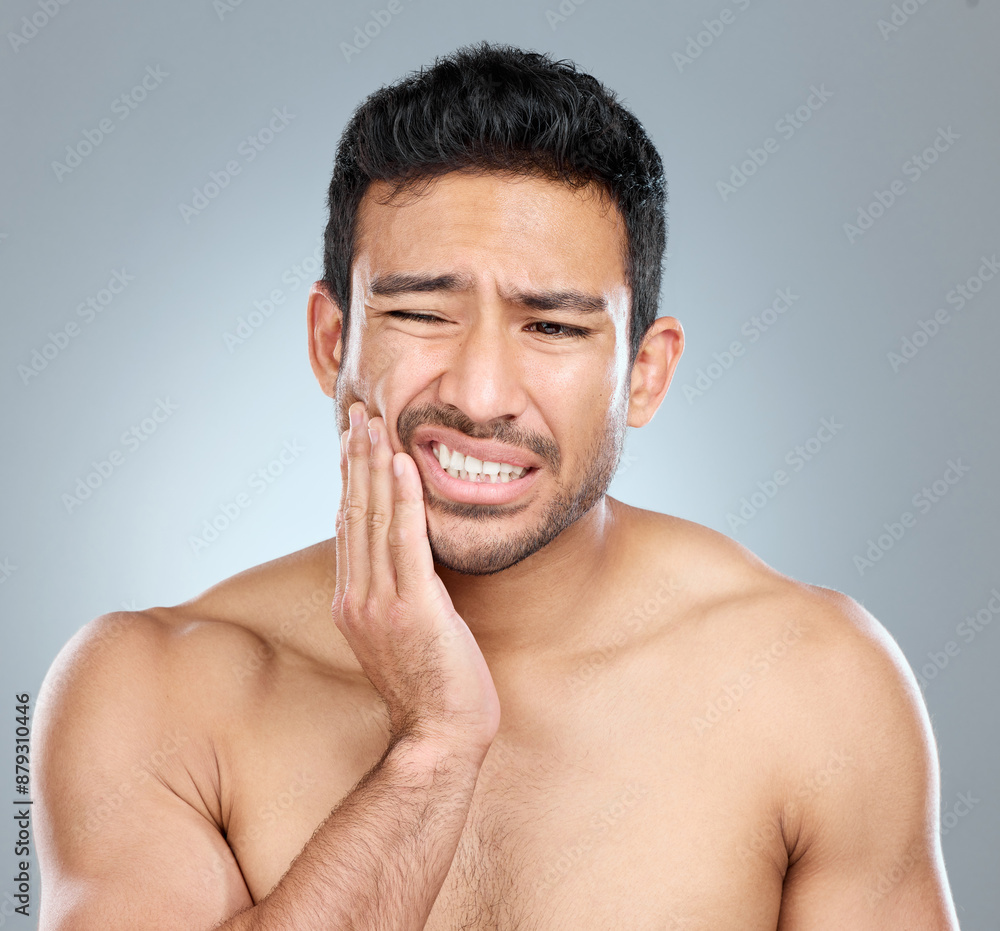 Pain, man and teeth with hand for toothache, mouth and sore on white background. Dental care, cavity and medical help for gum disease and injury for male person, decay or cheek for healthy in studio Pain, man and teeth with hand for toothache, mouth and sore on white background. Dental care, cavity and medical help for gum disease and injury for male person, decay or cheek for healthy in studio