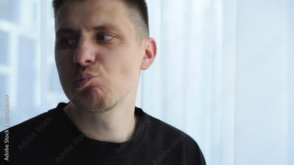 The man is worried and bites his lips. The man is worried.
Habit of biting lips.
Symptoms of a person with nervous diseases The man is worried and bites his lips. The man is worried.
Habit of biting lips.
Symptoms of a person with nervous diseases
