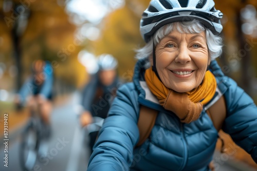 Portrait of a beautiful lady who is riding a bicycle with her elderly friends.