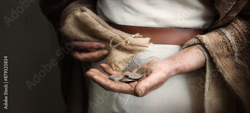 Картината върху платно A handful of silver coins in the hands of an old man