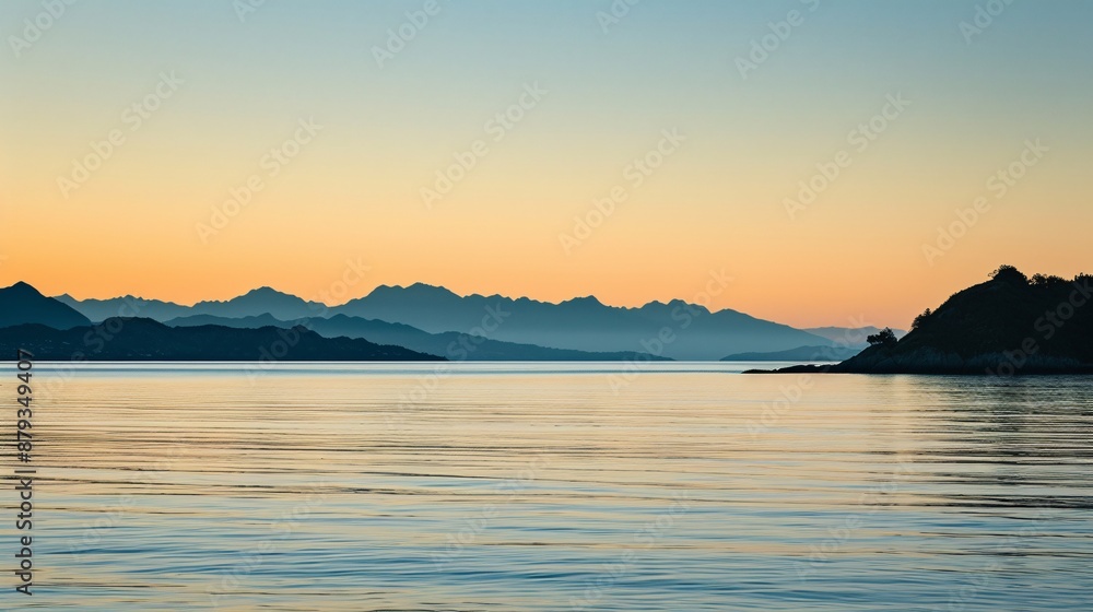 a body of water with mountains in the background a body of water with mountains in the background