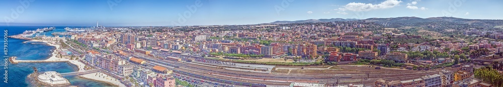 Obraz premium Drone panorama over the Italian city of Civitavecchia with harbor and cruise ships during the day