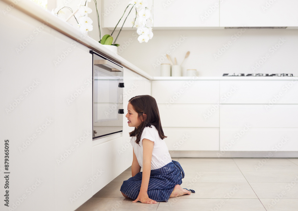 Baking, oven or waiting and girl in kitchen of home for patience at cooking food with appliance. Excited, happy and smile of child baker on floor of apartment for development, diet or growth Baking, oven or waiting and girl in kitchen of home for patience at cooking food with appliance. Excited, happy and smile of child baker on floor of apartment for development, diet or growth