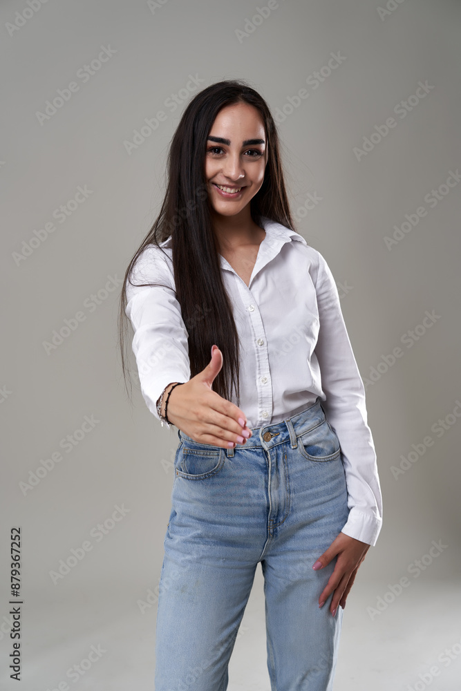 Happy latin businesswoman offering handshake Happy latin businesswoman offering handshake