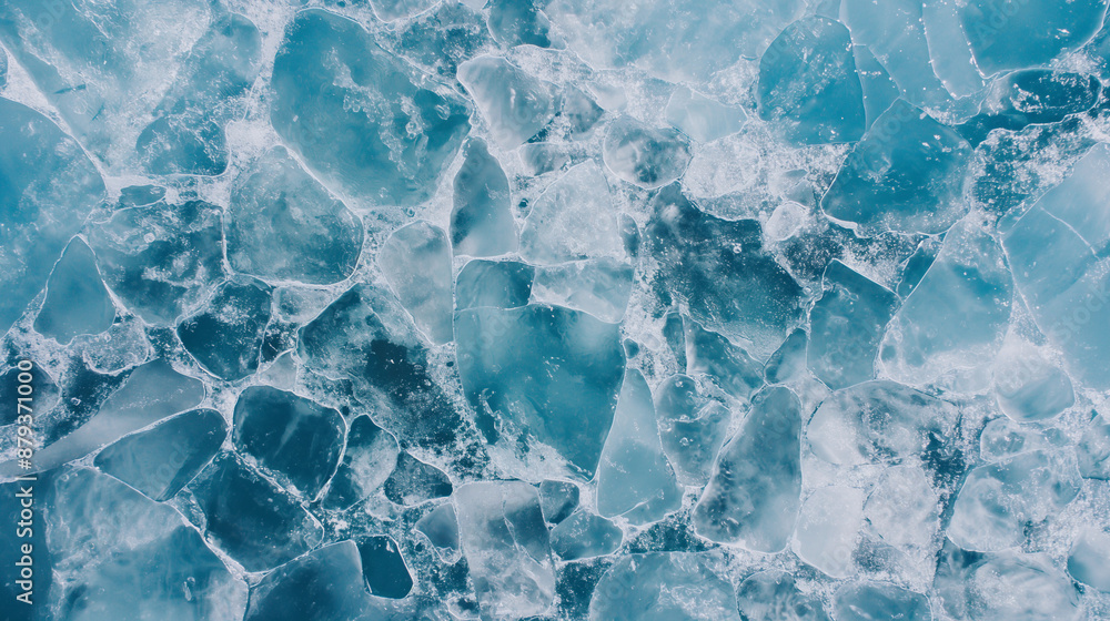 The image is of a blue and white background with a lot of ice and snow The image is of a blue and white background with a lot of ice and snow