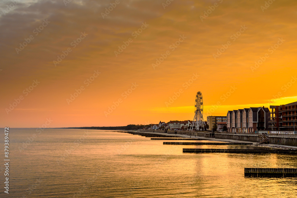 View of promenade of resort town of Zelenogradsk on the coast of Baltic sea at sunrise. Russia