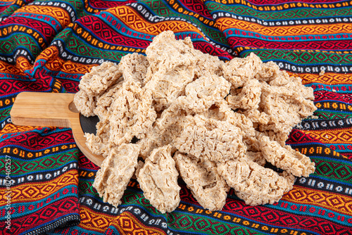 Traditional Anatolian chips (Turkish name is Tarhana). Pieces of the sikma tarhana is a dried food ingredient, based on a fermented mixture of grains and yogurt or fermented milk. photo