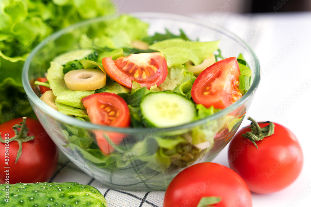Healthy and dietary vegetable salad on the table. Healthy food concept. Close-up. Selective focus. Healthy and dietary vegetable salad on the table. Healthy food concept. Close-up. Selective focus.