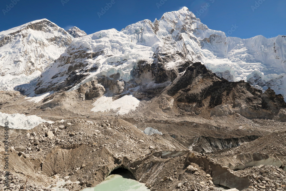 View from Khumbu Glacier up to the snow covered peaks of the West Ridge of Mount Everest, Mount Everest and Mount Nuptse, Mount Everest Base Camp Trek, EBC, Nepal View from Khumbu Glacier up to the snow covered peaks of the West Ridge of Mount Everest, Mount Everest and Mount Nuptse, Mount Everest Base Camp Trek, EBC, Nepal