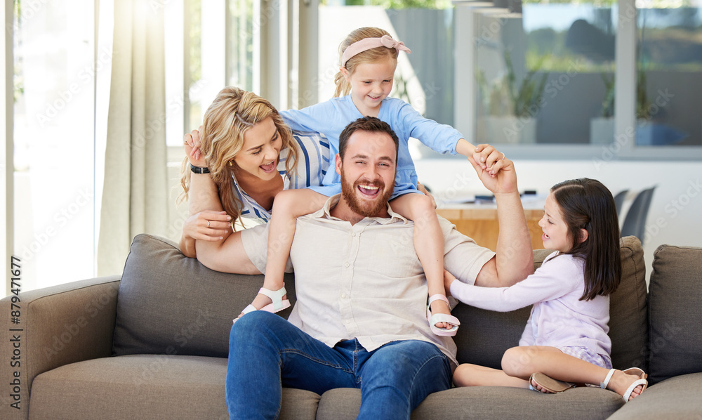 Happy family, portrait and playing with children on sofa for bonding, holiday or weekend together at home. Father, mother and little girls, sisters or siblings enjoying time with parents at house Happy family, portrait and playing with children on sofa for bonding, holiday or weekend together at home. Father, mother and little girls, sisters or siblings enjoying time with parents at house