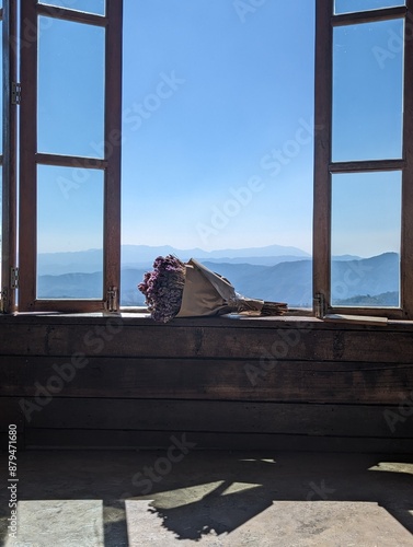 Bouquet on window of a mountain house in northern Thailand