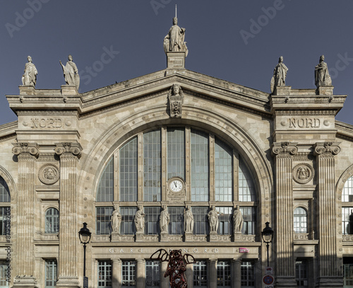 Exterior architecture of Gare du Nord (Paris train station). one of six railroad stations in Paris, France. Busiest railway station in Europe, Space for text, Selective focus. photo