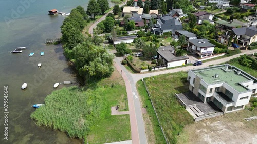 charzykowy poland aerial village town city low level holiday vacation travel destination lake district water blue boats anchored parked docked harbor photo