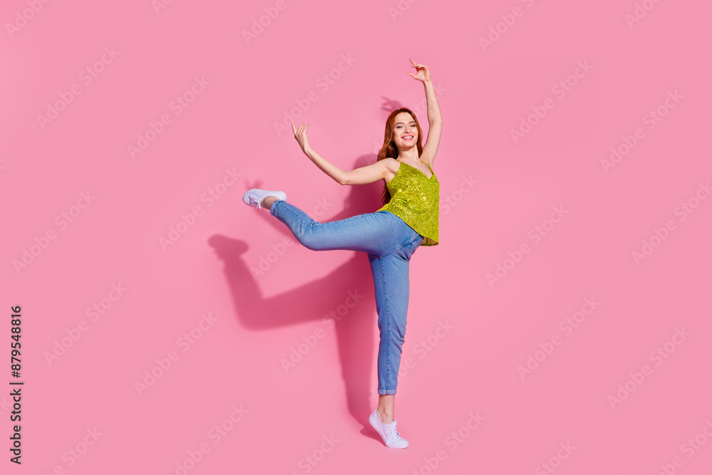 Full size photo of pretty young woman dancing wear shiny top isolated on pink color background Full size photo of pretty young woman dancing wear shiny top isolated on pink color background