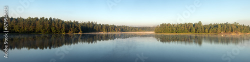 lake with fog on a summer morning