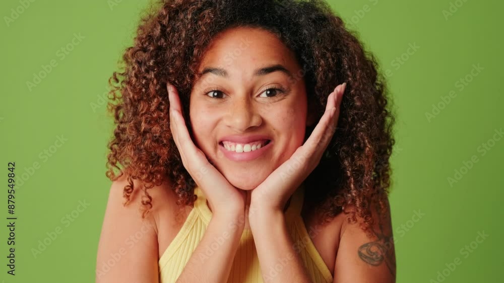 Close-up of a happy and joyfull surprised girl on a green screen background, screams wow Close-up of a happy and joyfull surprised girl on a green screen background, screams wow
