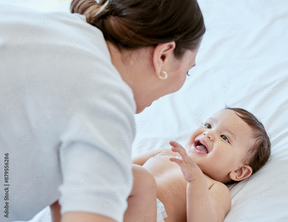 Smile, mom and baby on bed with playing, bonding and laughing together with happy toddler. Home, mother and infant girl relax in bedroom with fun for growth, love and support in child development Smile, mom and baby on bed with playing, bonding and laughing together with happy toddler. Home, mother and infant girl relax in bedroom with fun for growth, love and support in child development