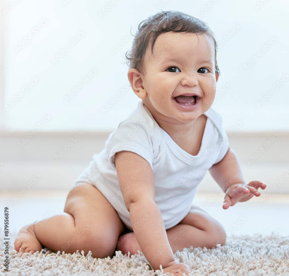 Happy, smile and baby on floor in home for child development, wellness and growth. Family, childhood and portrait of young infant in living room for learning to crawl, playing and relax in house Happy, smile and baby on floor in home for child development, wellness and growth. Family, childhood and portrait of young infant in living room for learning to crawl, playing and relax in house