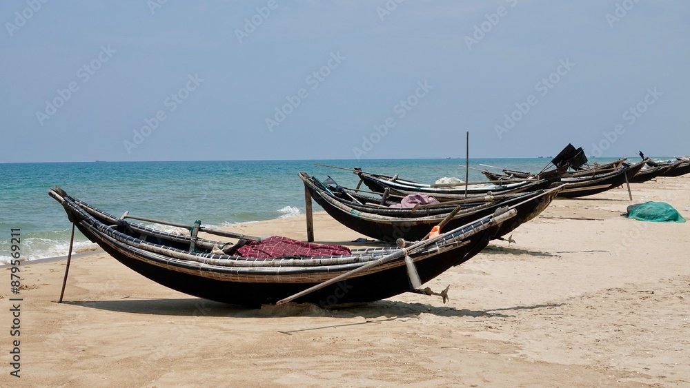 Fisher boats at the beach near Hue, Vietnam. Fisher boats at the beach near Hue, Vietnam.
