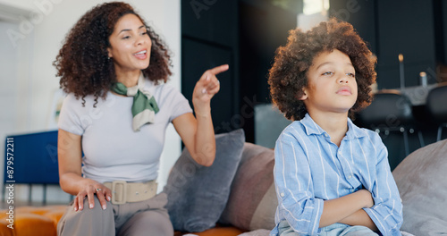Fotografi Discipline, frustrated and mom scolding child for behavior problem, naughty attitude and punishment on home sofa