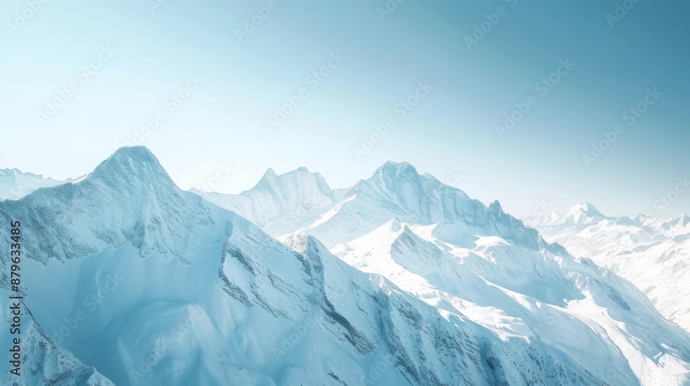 A breathtaking view of snow-covered mountain peaks, bathed in soft sunlight against a clear blue sky A breathtaking view of snow-covered mountain peaks, bathed in soft sunlight against a clear blue sky