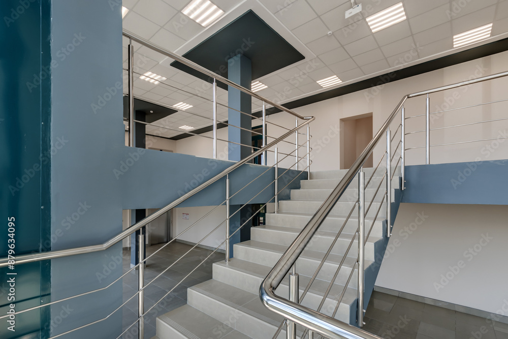 Fototapeta premium stairs emergency and evacuation exit stair in up ladder in a new office building