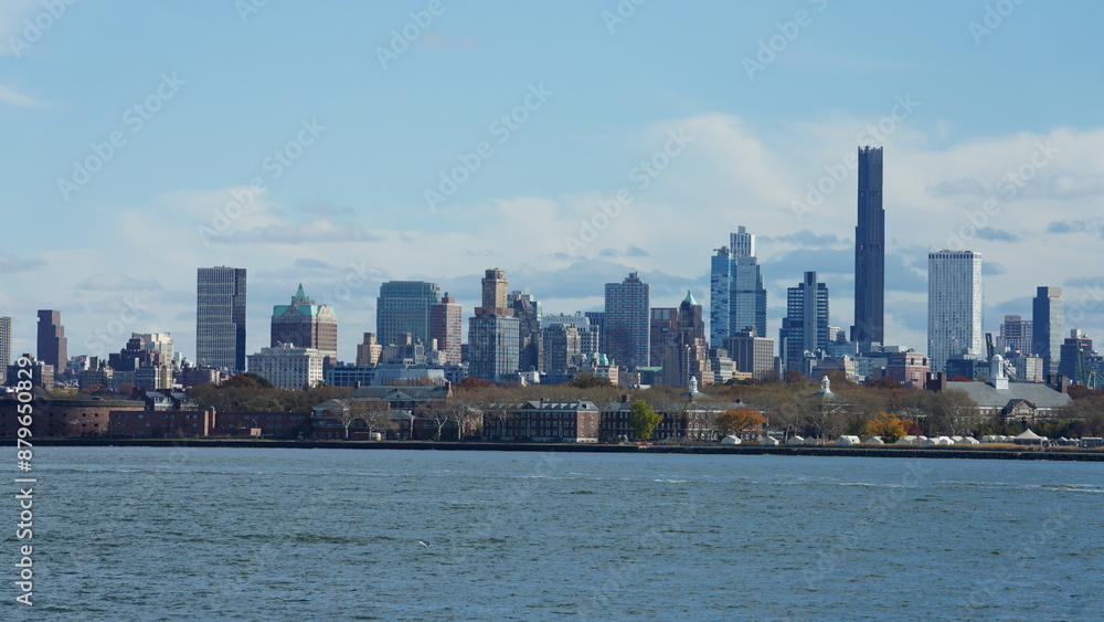The New York manhattan view from the ferry boat in the sunny day The New York manhattan view from the ferry boat in the sunny day