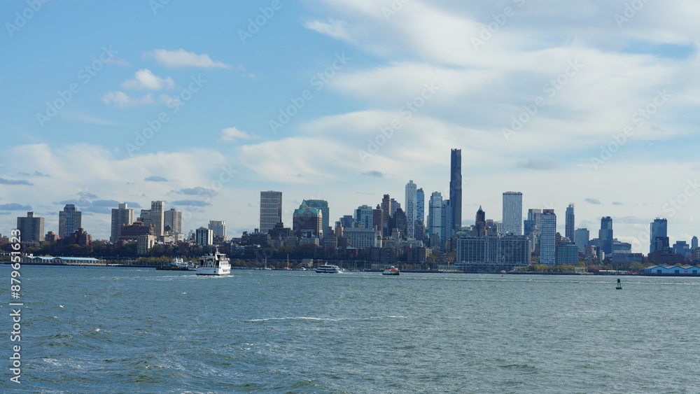 The New York manhattan view from the ferry boat in the sunny day The New York manhattan view from the ferry boat in the sunny day