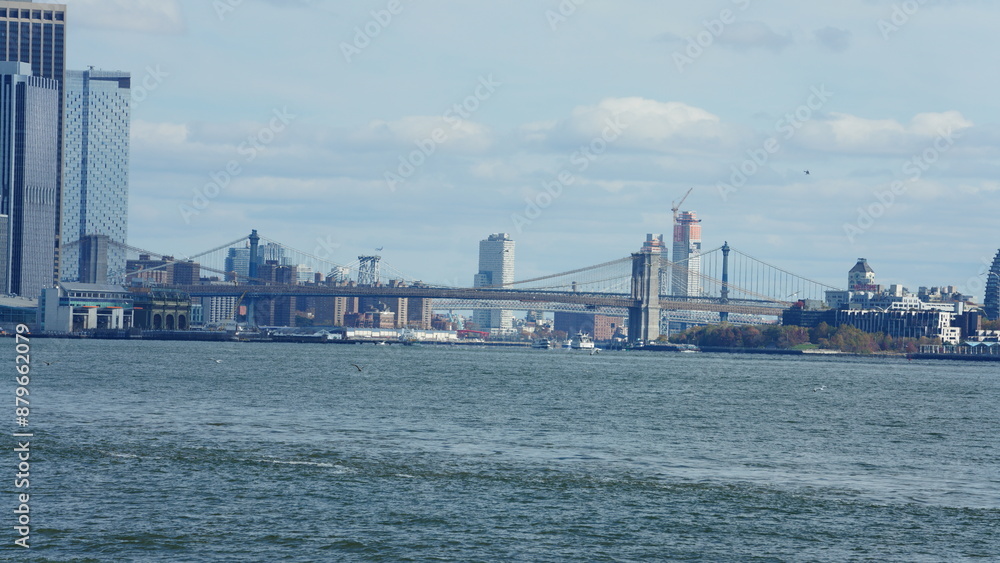 The New York manhattan view from the ferry boat in the sunny day The New York manhattan view from the ferry boat in the sunny day