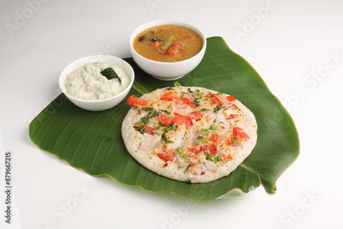 Uthappam or Uttapam is a type of dosa from southern India that is thicker, with tomato, onion, chilli packets.
