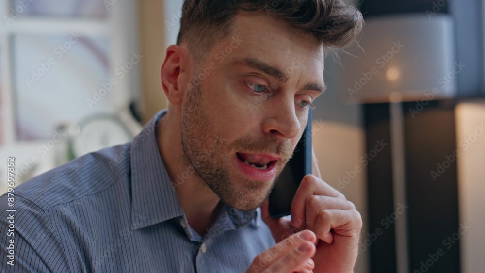 Closeup angry entrepreneur arguing at phone call at office. Businessman shouting Closeup angry entrepreneur arguing at phone call at office. Businessman shouting