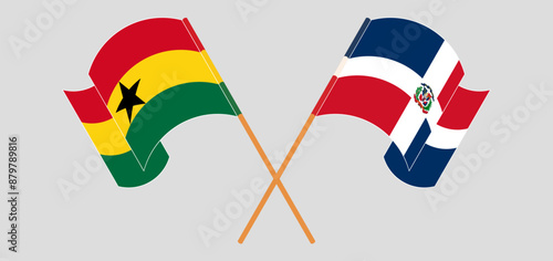 Crossed and waving flags of Ghana and Dominican Republic