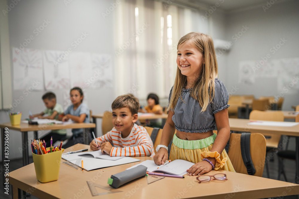young caucasian girl stand and answer question of teacher young caucasian girl stand and answer question of teacher