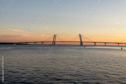 cable-stayed bridge in the rays of the setting sun