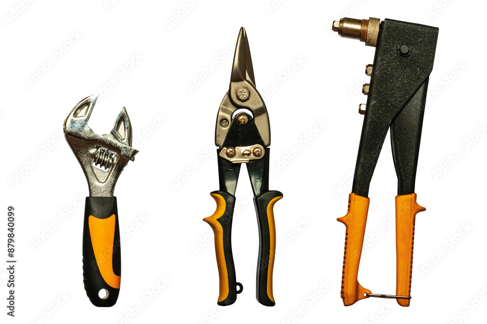 Photo of tools with a cut-out background (transparent background). Tools: adjustable wrench, metal shears, and rivet gun. Photo of tools with a cut-out background (transparent background). Tools: adjustable wrench, metal shears, and rivet gun.