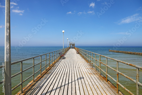 Fototapeta Naklejka Na Ścianę i Meble -  Pier on the Baltic Sea on a sunny day in Sianozety, West Pomerania, Poland