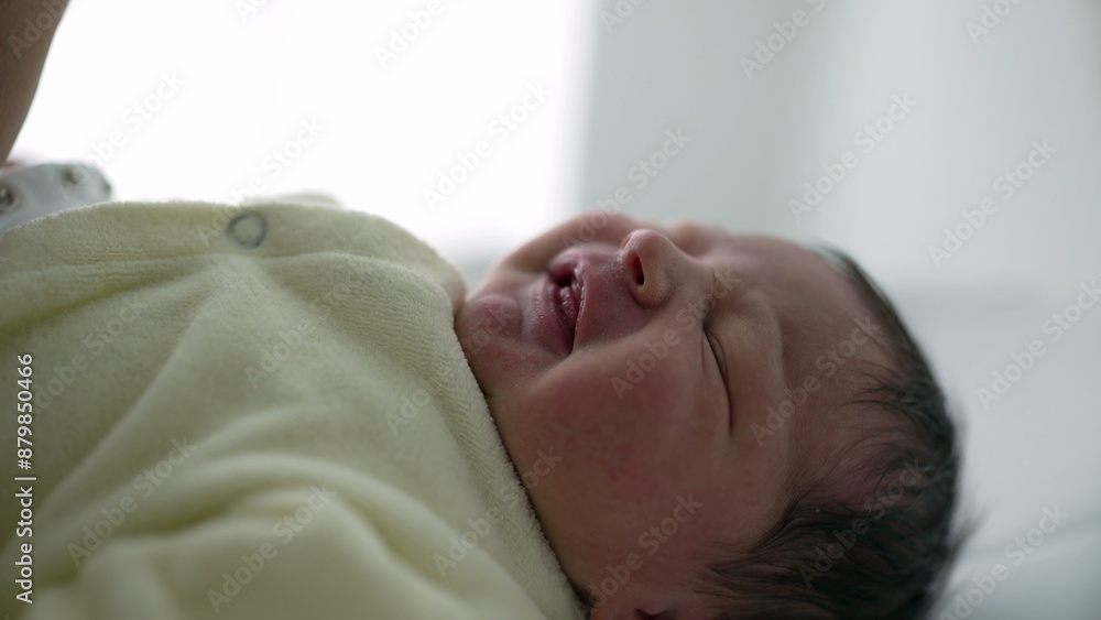 Newborn baby lying on a soft surface, dressed in a cozy cream outfit. calm and serene expression on the baby's face conveys a sense of tranquility and innocence, Newborn baby lying on a soft surface, dressed in a cozy cream outfit. calm and serene expression on the baby's face conveys a sense of tranquility and innocence,