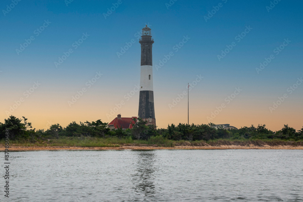 The Fire Island Lighthouse with sunset light in the background The Fire Island Lighthouse with sunset light in the background