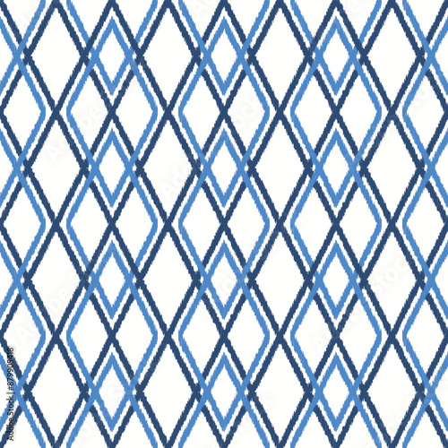 Ikat geometric ornament with diamonds. Seamless vector pattern.